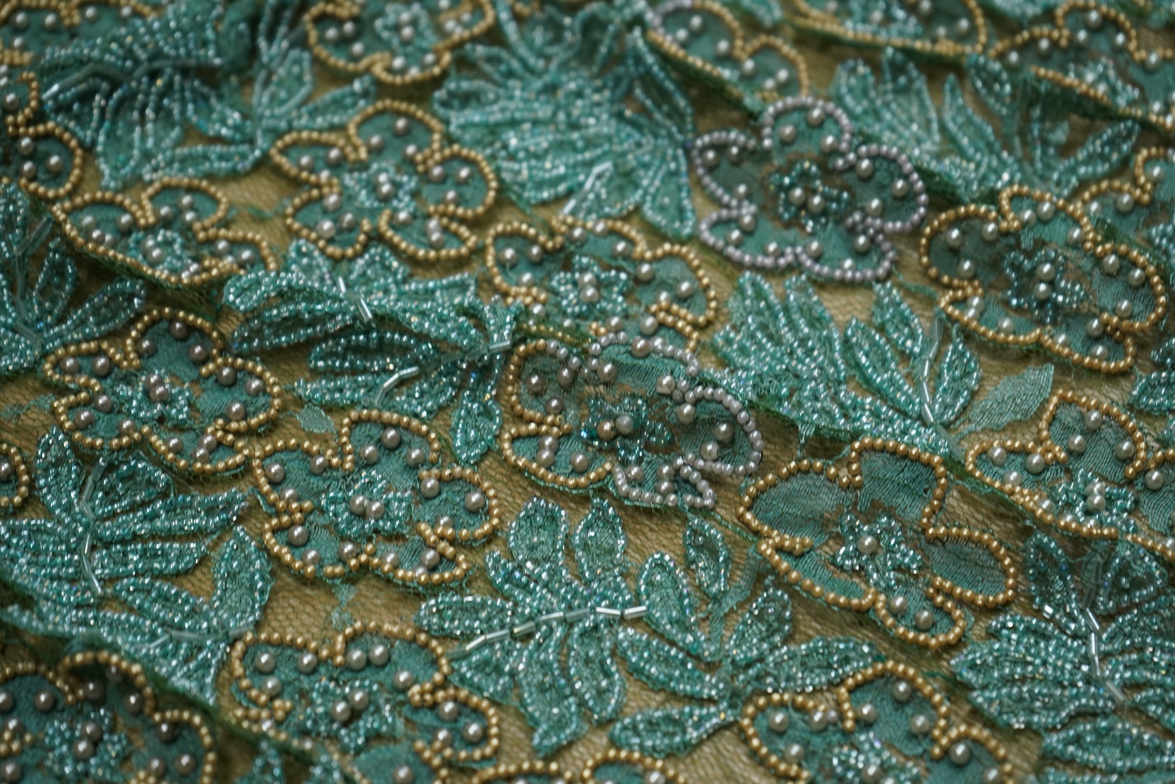 A beaded jacket, beadwork length and 1960's scarf